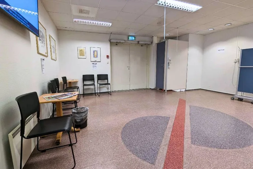 An empty office with a red carpet