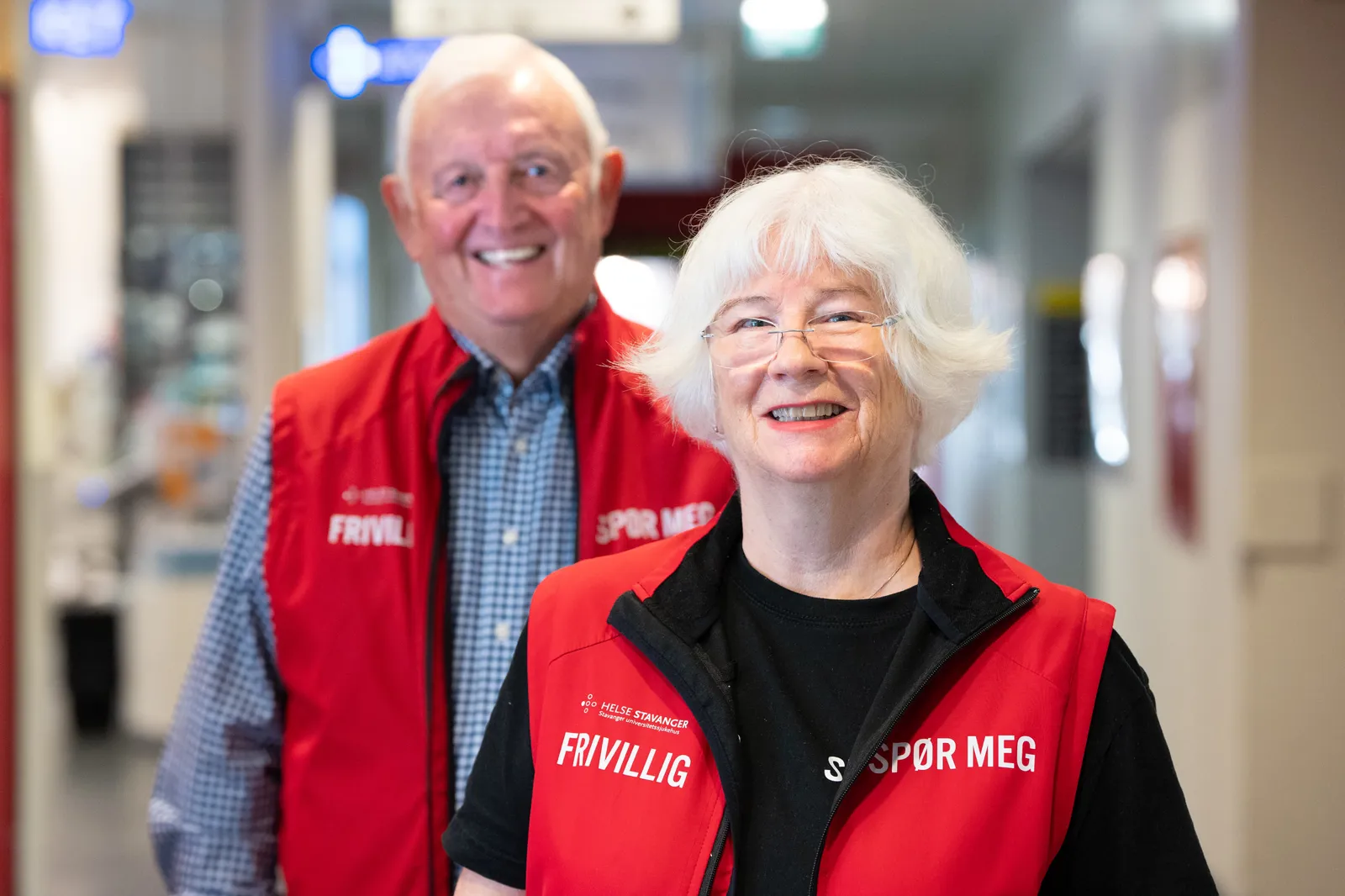 A man and a woman smiling