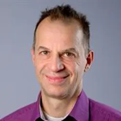 A man smiling for the camera